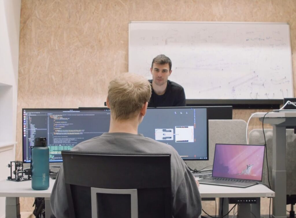 Dennis and Eugenio discuss Free Navigation at the arculus office 